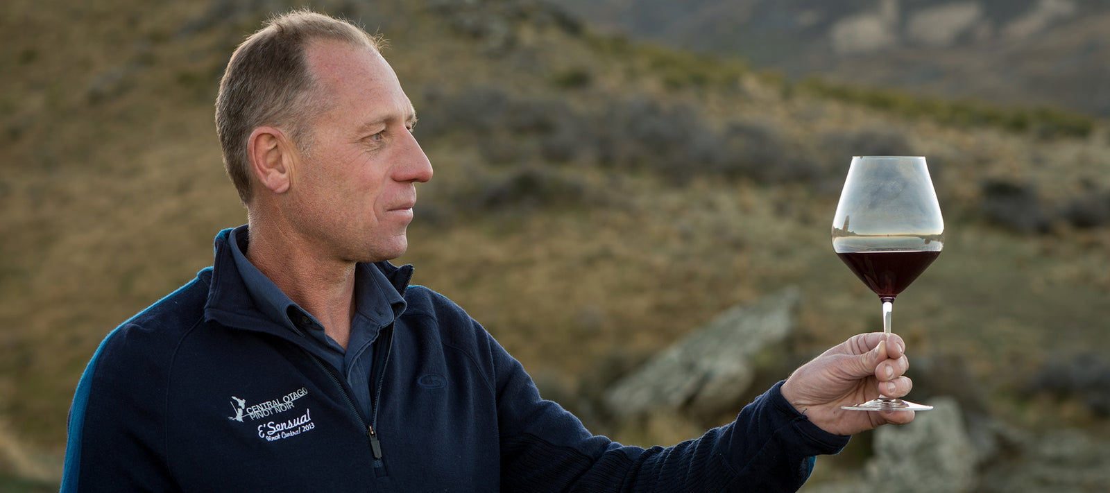 Winemaker Rudi Bauer with a a glass of Central Otago Pinot Noir from Bendigo, New Zealand